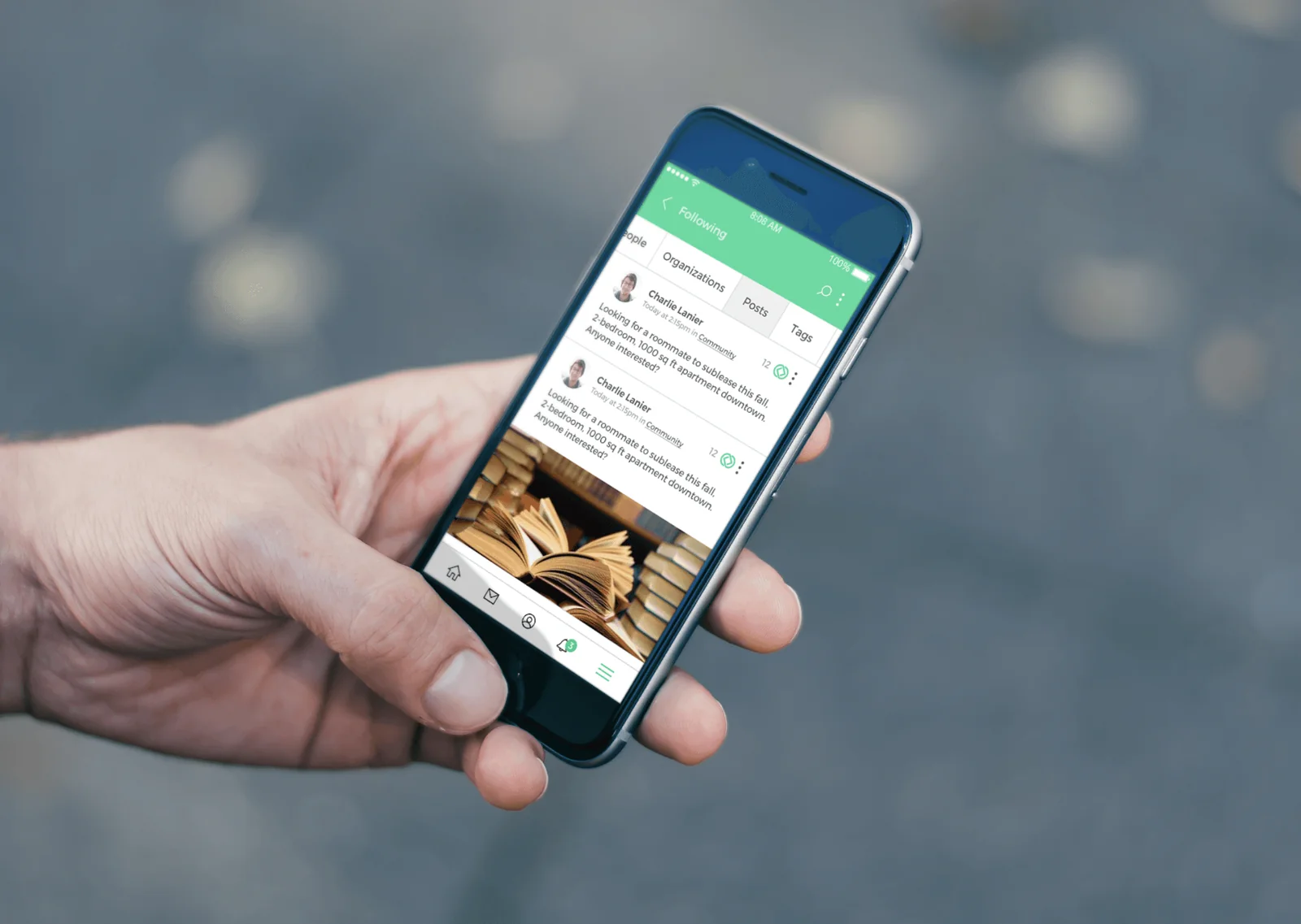 A hand holding a phone with the Loop app on screen